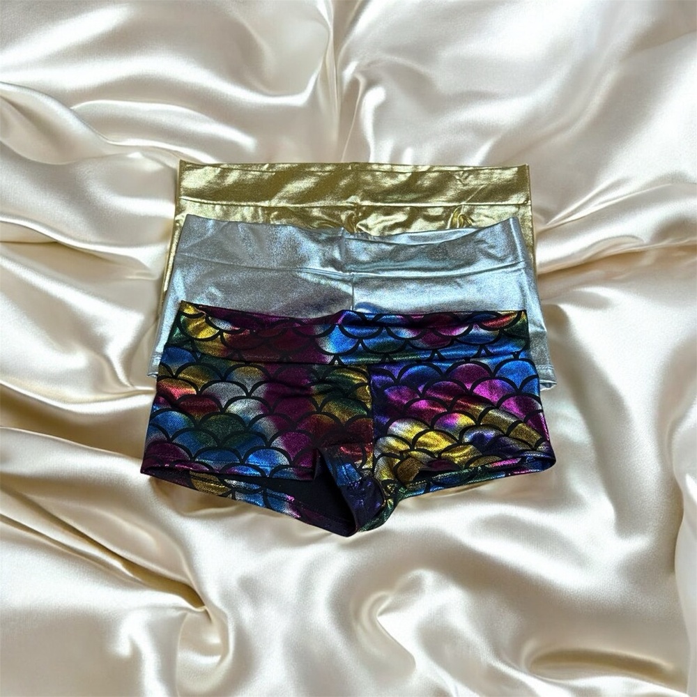 Three Shimmering mini shorts.